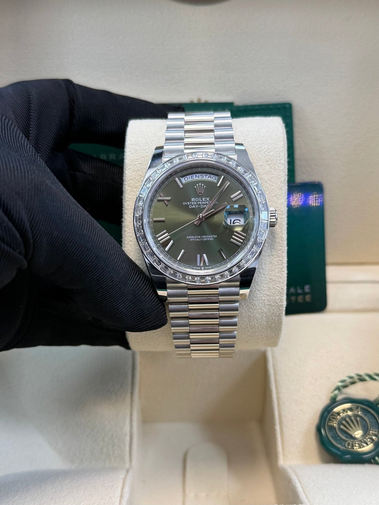 Rolex Day - Date 40 Baguette Diamond Bezel Olive Green Roman Dial President Bracelet 228396TBR German Day Wheel - WatchesOff5th