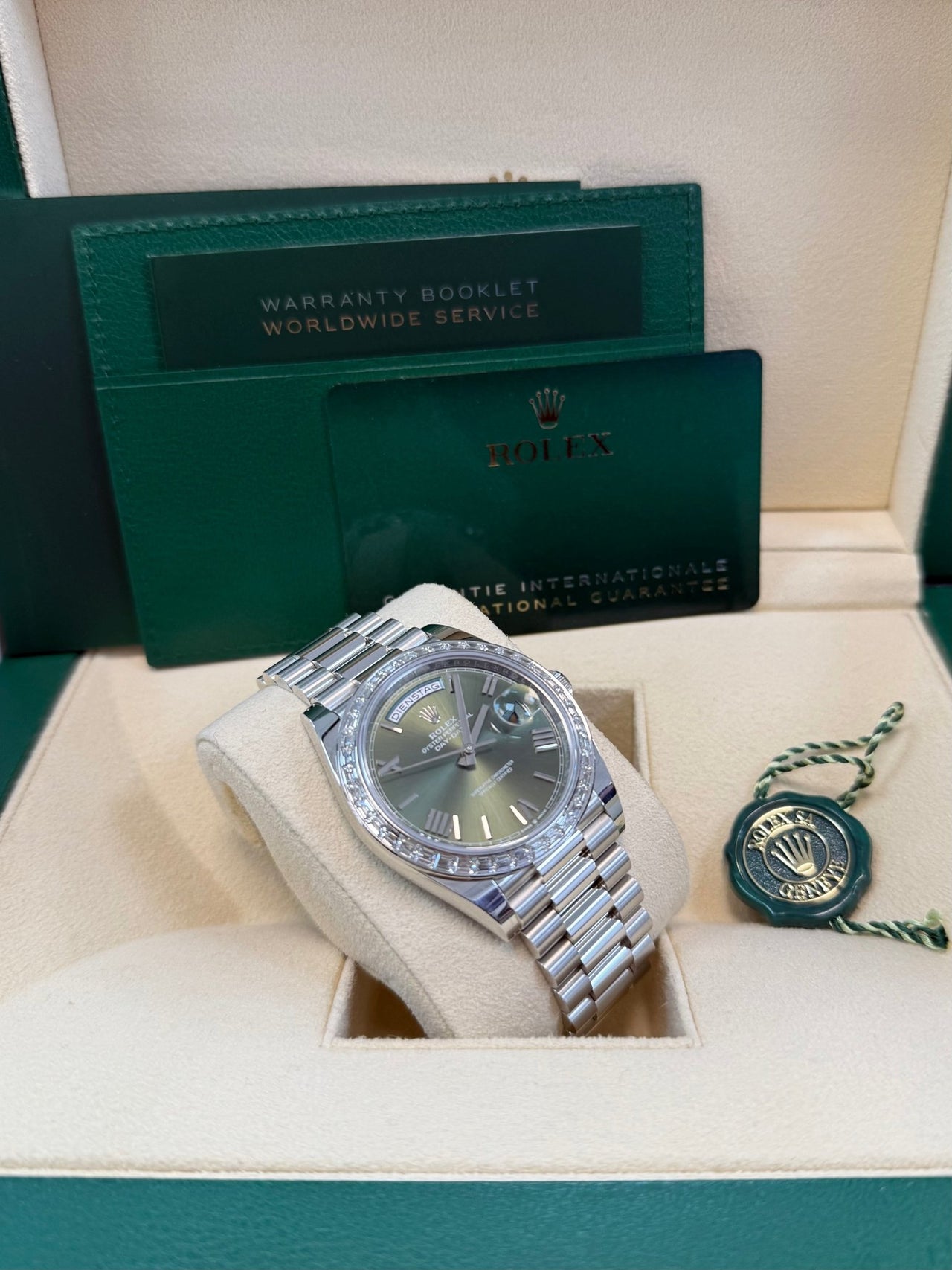 Rolex Day - Date 40 Baguette Diamond Bezel Olive Green Roman Dial President Bracelet 228396TBR German Day Wheel - WatchesOff5th