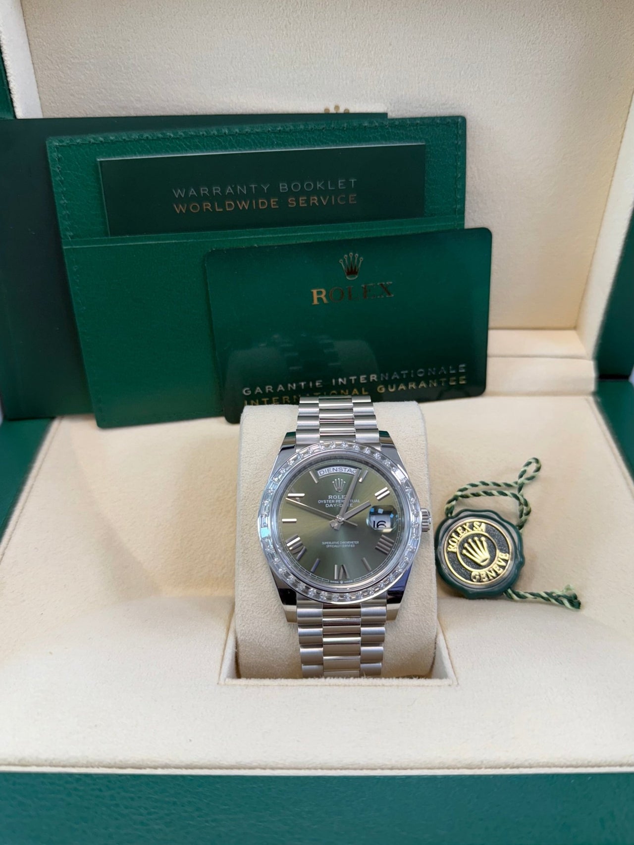 Rolex Day - Date 40 Baguette Diamond Bezel Olive Green Roman Dial President Bracelet 228396TBR German Day Wheel - WatchesOff5th