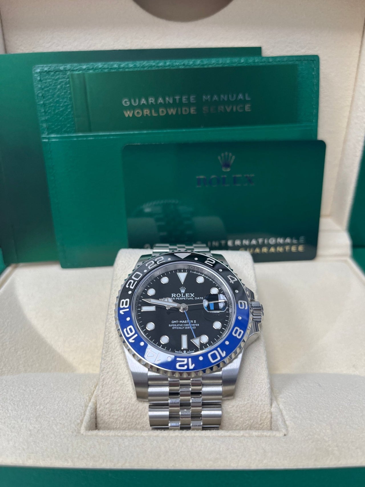 Rolex GMT-Master II "The Batman" with reference number 126710BLNR in it's box. Dial and face shown, as well as official Rolex box and documents.