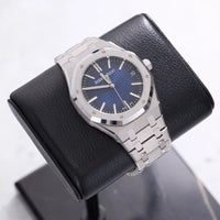 Thumbnail for Audemars Piguet Royal Oak Selfwinding 41mm 18K White Gold Smoked Blue Dial Fixed Bezel Ref 15510BC.OO.1320BC.04 - front view on display cushion