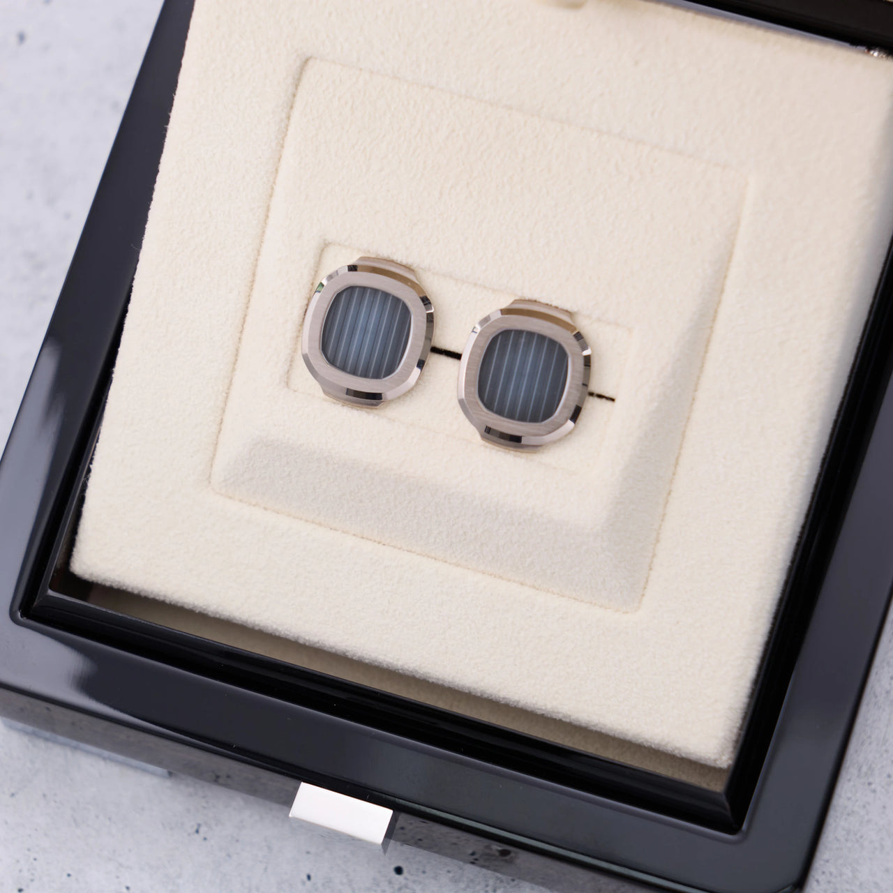 Patek Philippe Nautilus Cufflinks 18K White Gold Blue Dial - in the original box, angled view