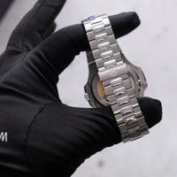 Thumbnail for Patek Philippe Nautilus 40mm Stainless Steel White Dial (Ref 5711/1A-011) - steel bracelet and fold-over clasp, held in hand