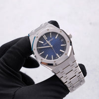 Thumbnail for Audemars Piguet Royal Oak Selfwinding 41mm 18K White Gold Smoked Blue Dial Fixed Bezel Ref 15510BC.OO.1320BC.04 - dial view held in hand