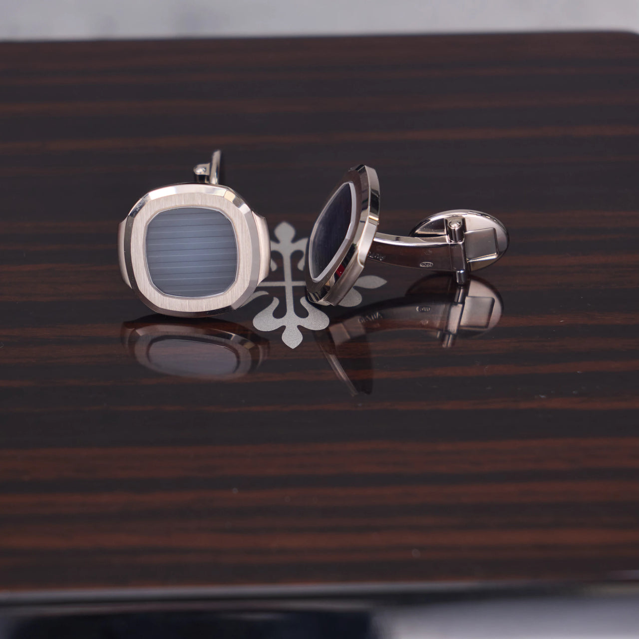 Patek Philippe Nautilus Cufflinks 18K White Gold Blue Dial - on the box lid with the Calatrava cross