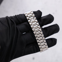 Thumbnail for Rolex Day-Date II 41mm Platinum Ice Blue Concentric Roman Dial Smooth Bezel President Bracelet (Ref 218206) - President bracelet held in hand