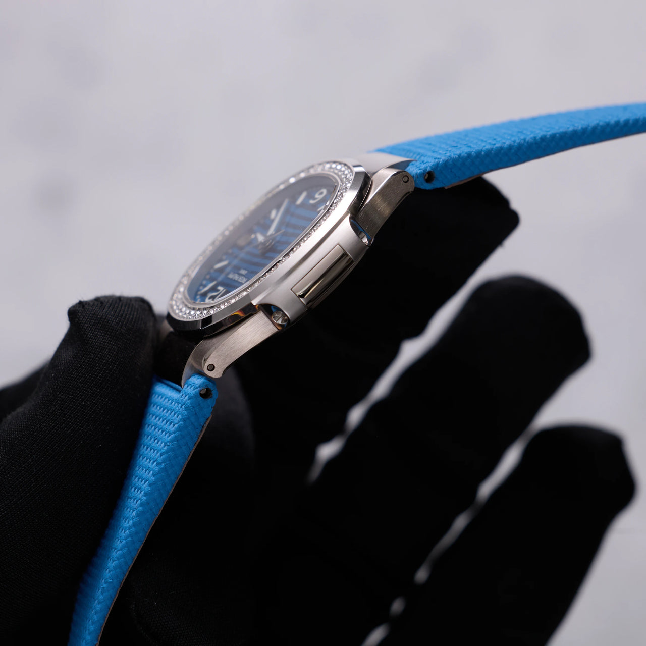 Patek Philippe Nautilus 32mm 18K White Gold Azure Blue Dial Diamond Bezel Ref 7010G-013 - case side view