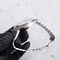 Thumbnail for Vacheron Constantin Overseas Tourbillon Skeleton 42.5mm Titanium Skeleton Dial 6000V/210T-B935 - case profile with the titanium bracelet, held in hand