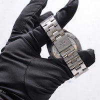 Thumbnail for Vacheron Constantin Overseas Tourbillon Skeleton 42.5mm Titanium Skeleton Dial 6000V/210T-B935 - folding clasp with the Maltese cross, held in hand
