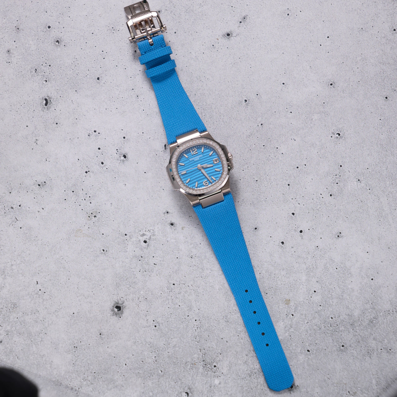 Patek Philippe Nautilus 32mm 18K White Gold Azure Blue Dial Diamond Bezel Ref 7010G-013 - full strap view