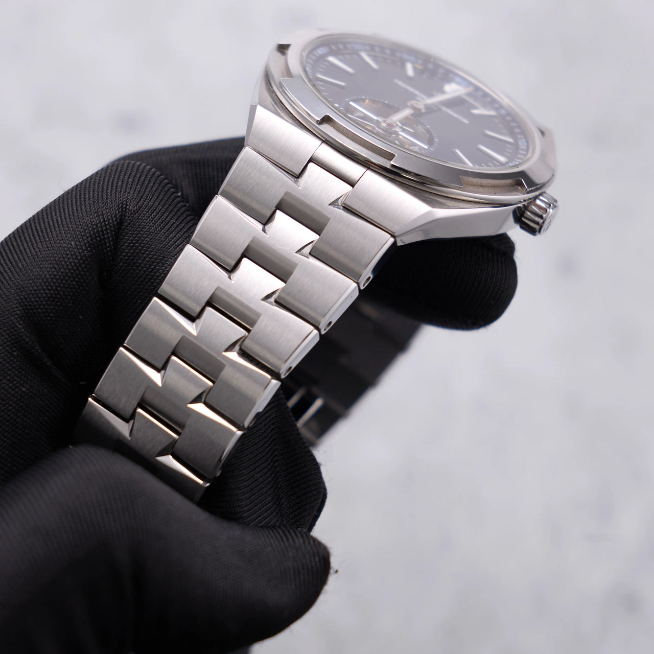 Vacheron Constantin Overseas Tourbillon 42.5mm Stainless Steel Blue Dial (Ref 6000V/110A-B544) - case and bracelet held in hand