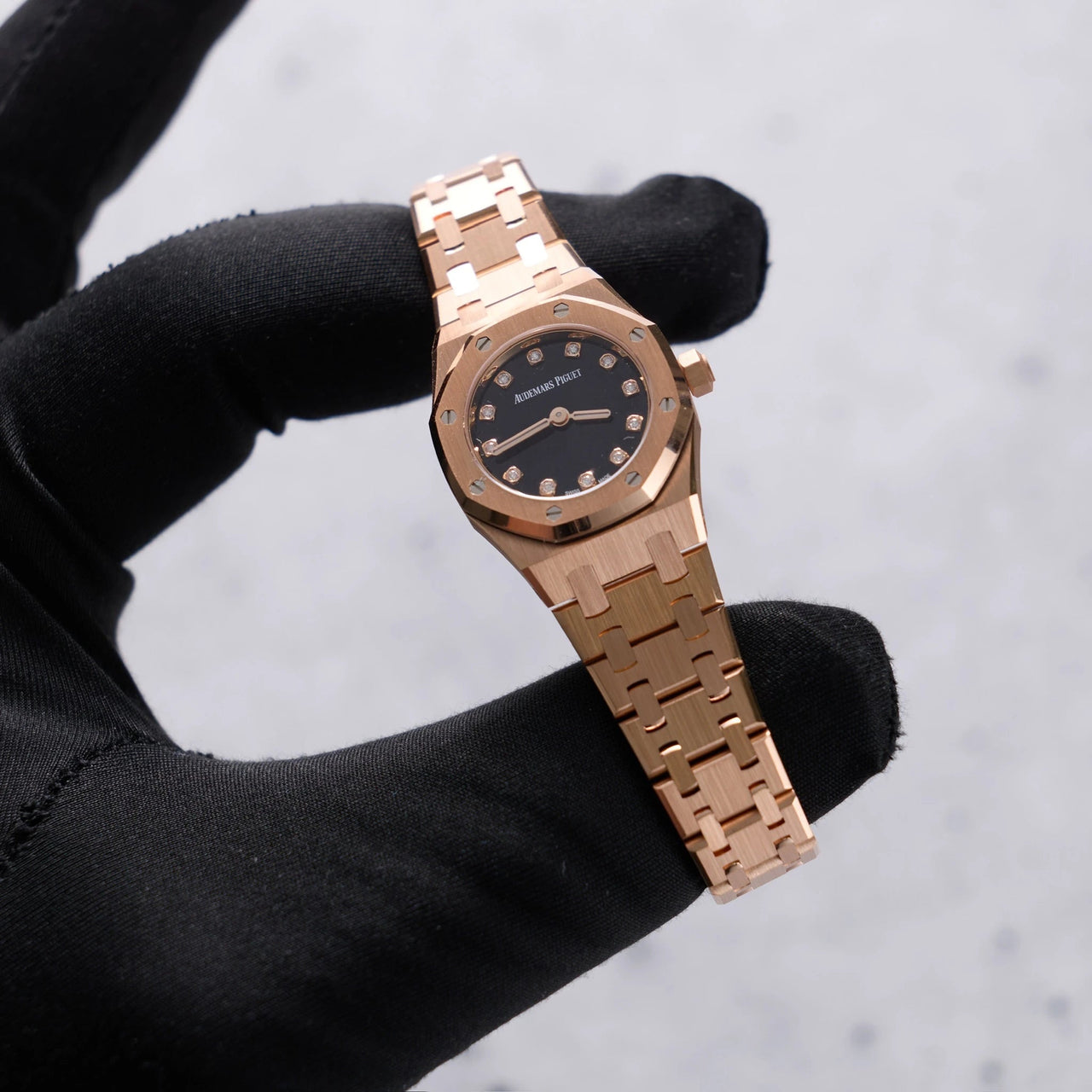 Audemars Piguet Royal Oak Mini Quartz 23mm 18K Pink Gold Black Onyx Diamond Dial Fixed Bezel (Ref 67630OR.OO.1312OR.01-B) - WatchesOff5thWatch