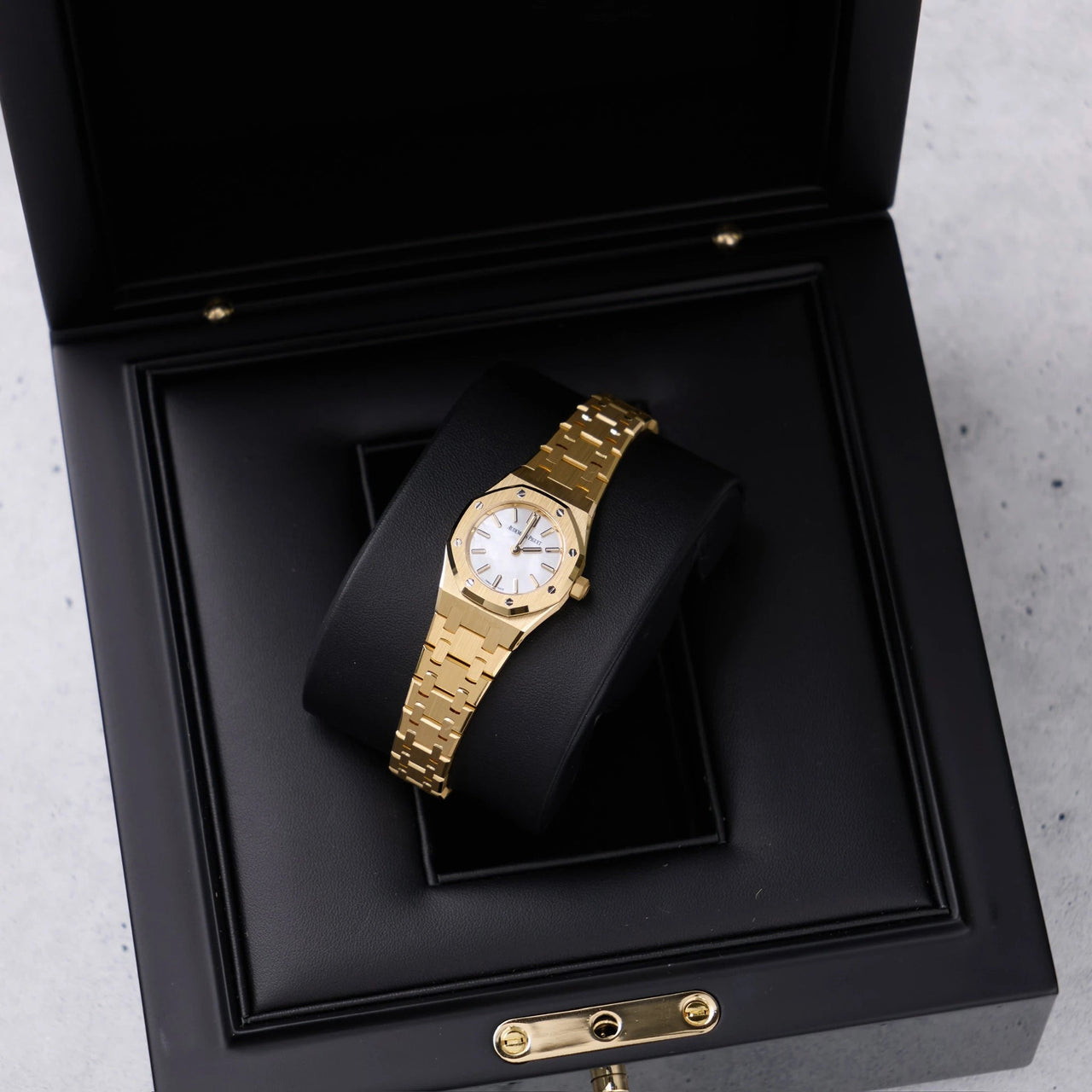 Audemars Piguet Royal Oak Mini Quartz 23mm 18K Yellow Gold White Mother of Pearl Dial (Ref 67630BA.OO.1312BA.03) - WatchesOff5thWatch