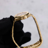 Thumbnail for Audemars Piguet Royal Oak Mini Quartz 23mm 18K Yellow Gold White Mother of Pearl Dial (Ref 67630BA.OO.1312BA.03) - WatchesOff5thWatch