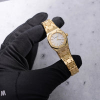 Thumbnail for Audemars Piguet Royal Oak Mini Quartz 23mm 18K Yellow Gold White Mother of Pearl Dial (Ref 67630BA.OO.1312BA.03) - WatchesOff5thWatch