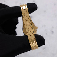Thumbnail for Audemars Piguet Royal Oak Mini Quartz 23mm 18K Yellow Gold White Mother of Pearl Dial (Ref 67630BA.OO.1312BA.03) - WatchesOff5thWatch