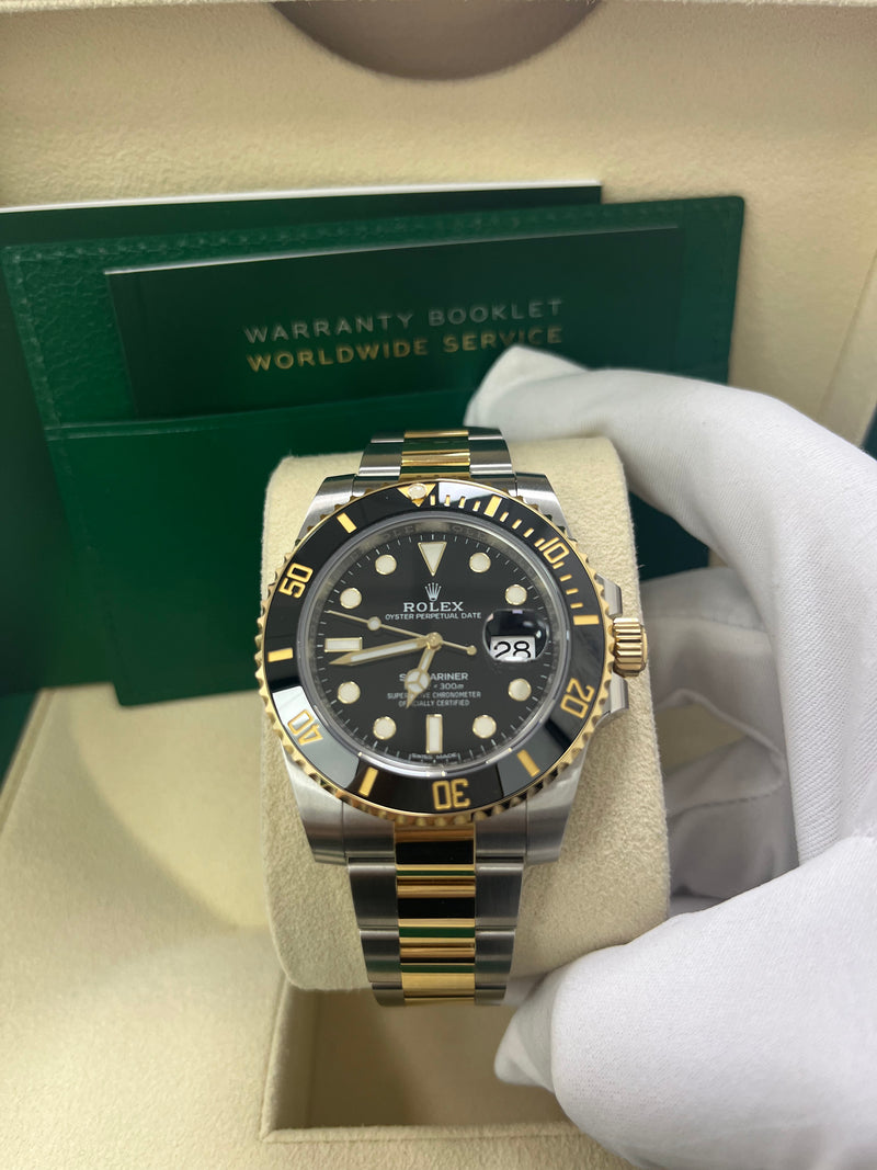 Rolex steel and yellow gold black dial hot sale