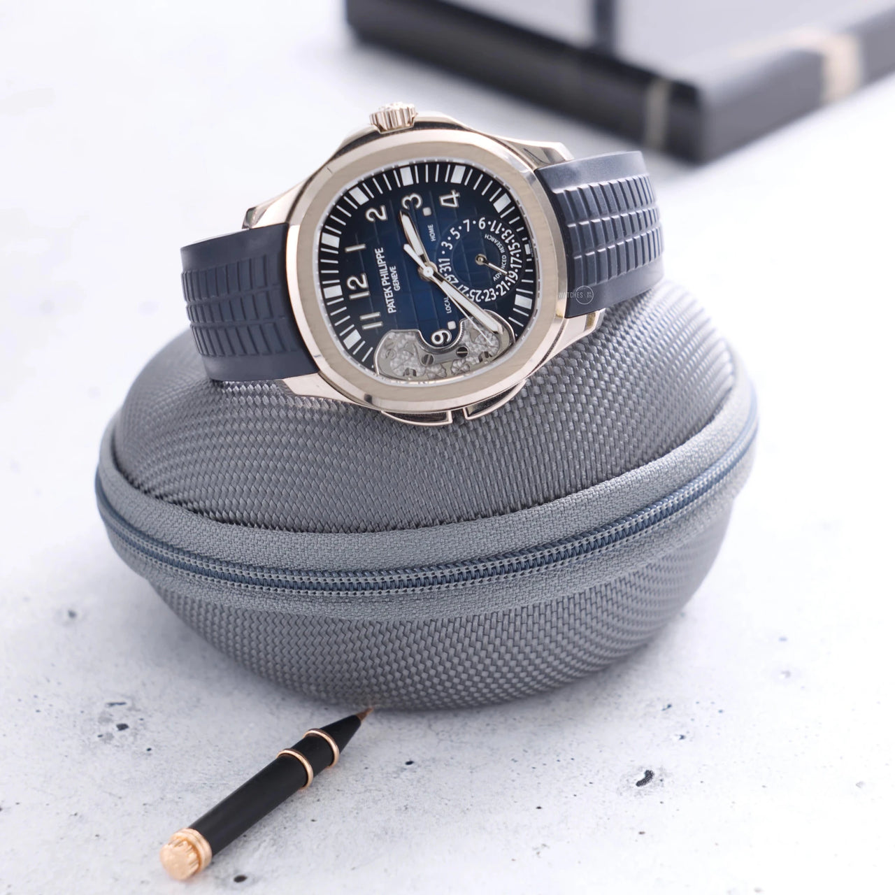 Patek Philippe Aquanaut Travel Time Advanced Research 40.8mm 18K White Gold Blue Dial Fixed Bezel (Ref 5650G - 001) - WatchesOff5thWatch