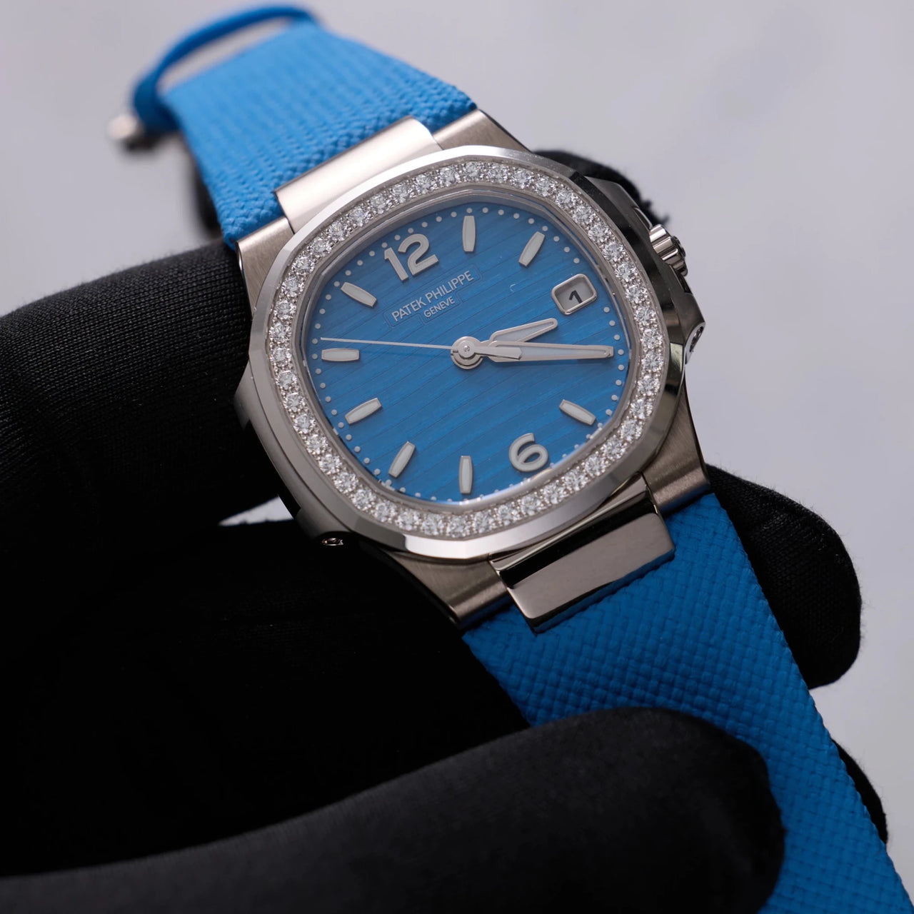 Patek Philippe Nautilus 32mm 18K White Gold Azure Blue Dial Diamond Bezel (Ref 7010G-013) - WatchesOff5thWatch