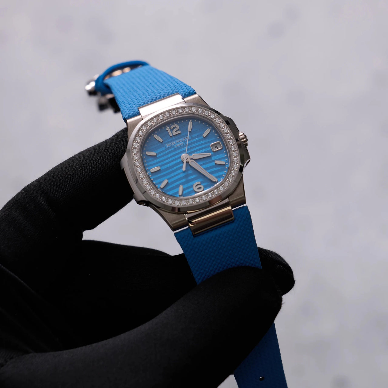 Patek Philippe Nautilus 32mm 18K White Gold Azure Blue Dial Diamond Bezel (Ref 7010G-013) - WatchesOff5thWatch