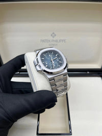 Thumbnail for Patek Philippe Nautilus 40 mm Steel Nautilus Travel Time Chronograph Blue Dial 5990/1A - 011 - WatchesOff5thWatch