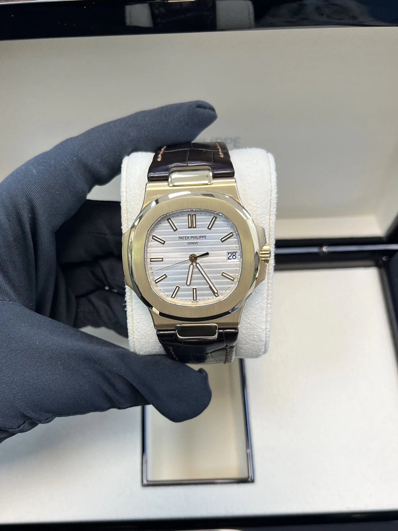 Patek Philippe Nautilus 5711J - 001 Nautilus 18K Yellow Gold White Index Dial - WatchesOff5thWatch