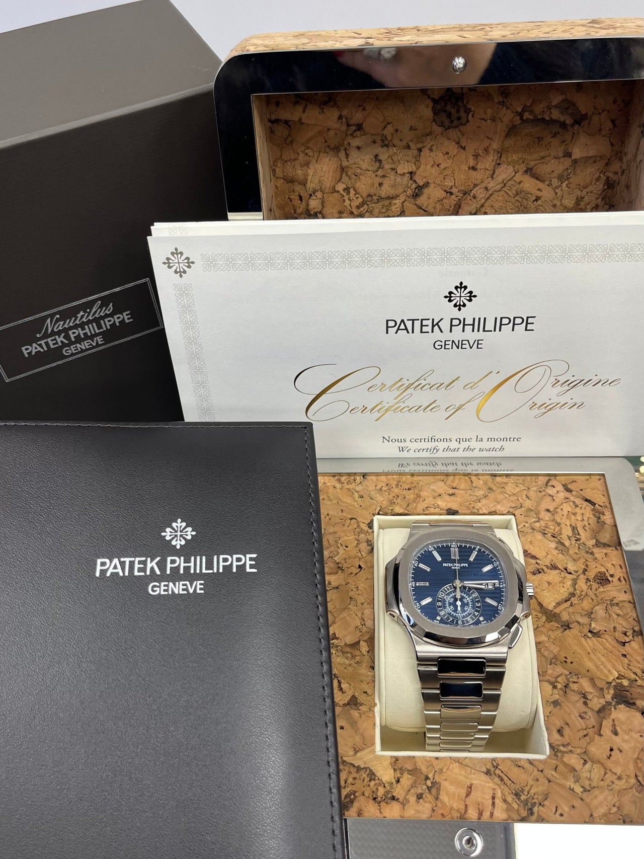 Patek Philippe Nautilus Chronograph White Gold Blue Dial 44mm Reference # 5976 - WatchesOff5thWatch