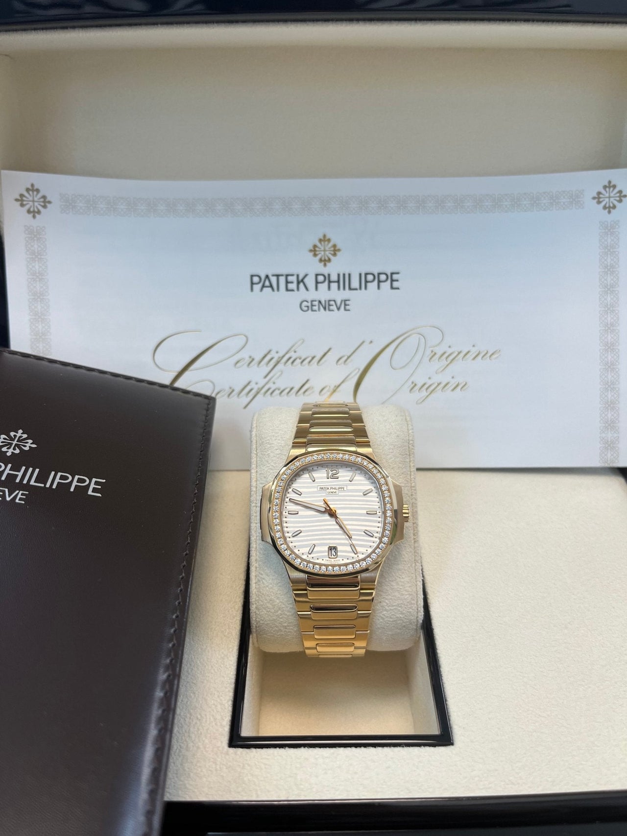 Patek Philippe Nautilus Ladies Rose Gold Nautilus White Dial Diamond Bezel 7118/1200R - 001 - WatchesOff5thWatch