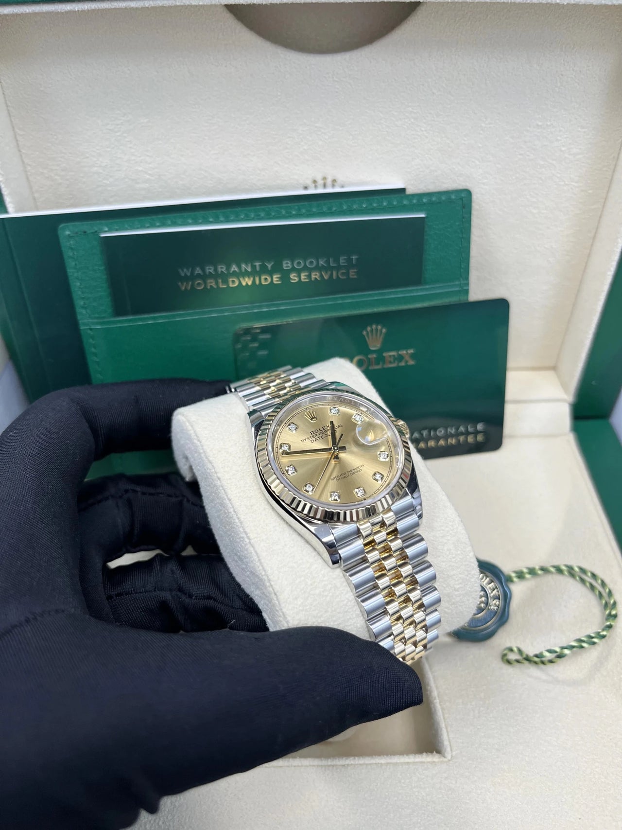 Rolex Datejust 36 Yellow Rolesor Champagne Diamond Dial Fluted Bezel (Ref 126233) - WatchesOff5thWatch