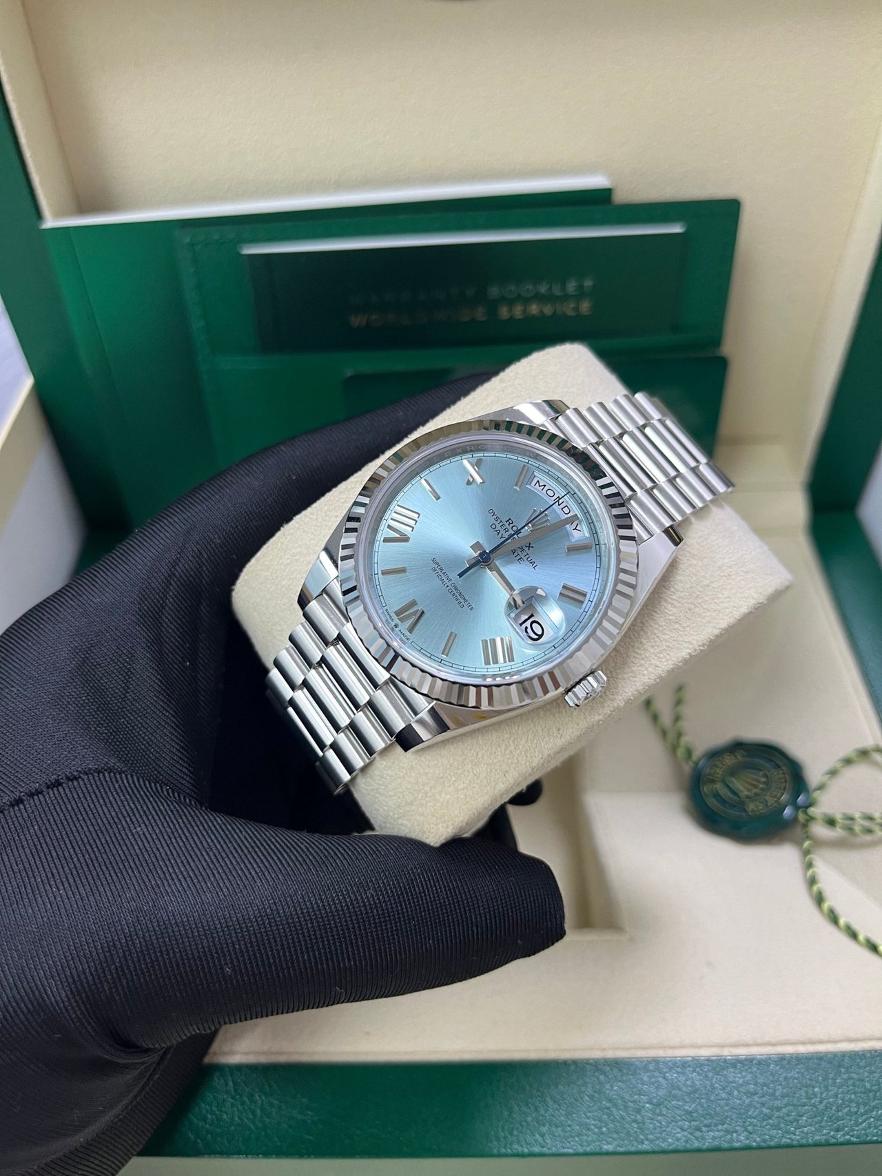 Rolex Day Date 40 Platinum Day Date 40 Watch Fluted Bezel Ice Blue Roman Dial President Bracelet 228236