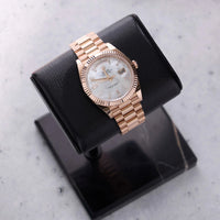 Thumbnail for Rolex Day-Date 40mm 18K Everose Gold White Mother of Pearl Baguette Diamond Dial Fluted Bezel President Bracelet (Ref 228235) - WatchesOff5thWatch