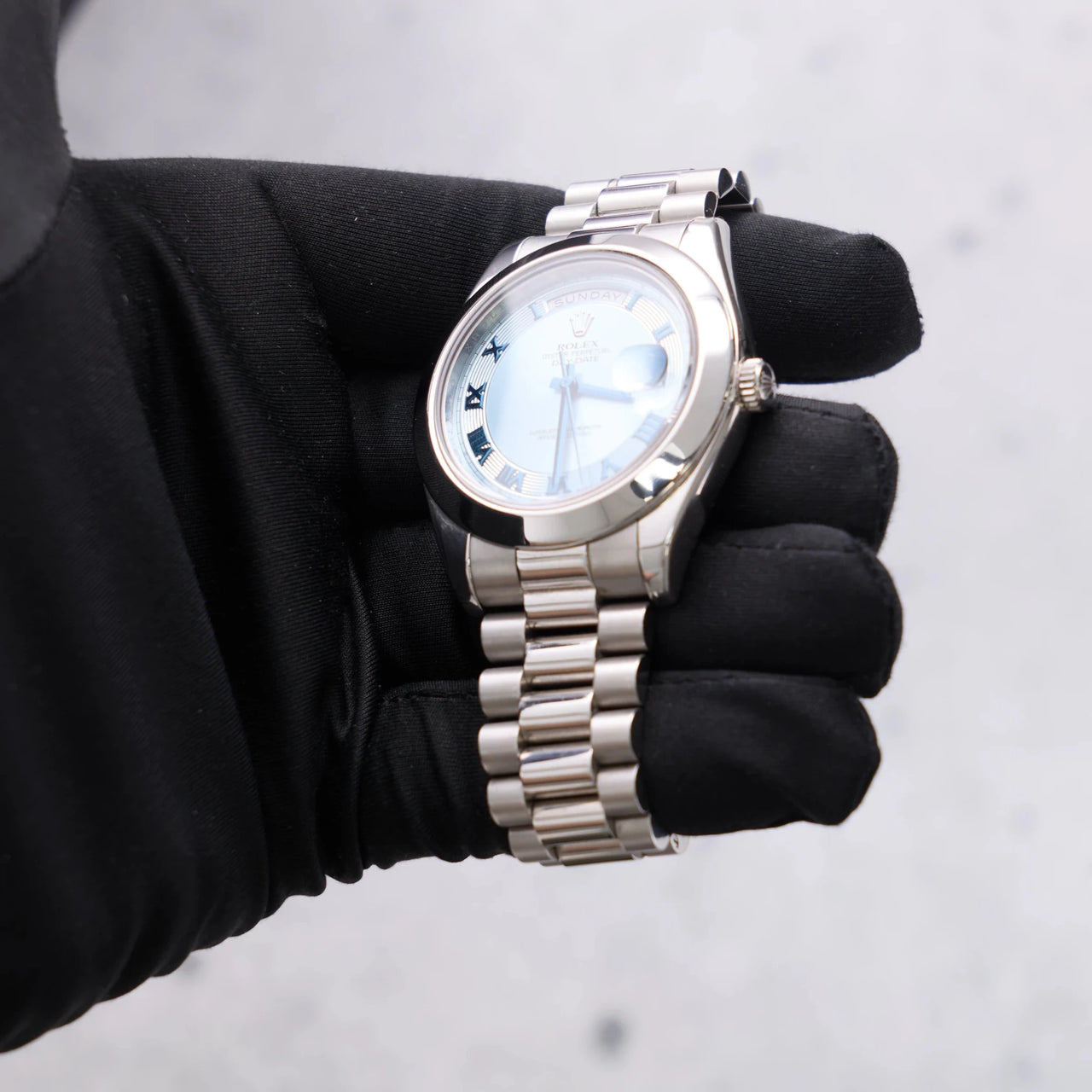 Rolex Day-Date II 41mm Platinum Ice Blue Concentric Roman Dial Smooth Bezel President Bracelet (Ref 218206) - WatchesOff5thWatch