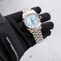 Thumbnail for Rolex Day-Date II 41mm Platinum Ice Blue Concentric Roman Dial Smooth Bezel President Bracelet (Ref 218206) - WatchesOff5thWatch