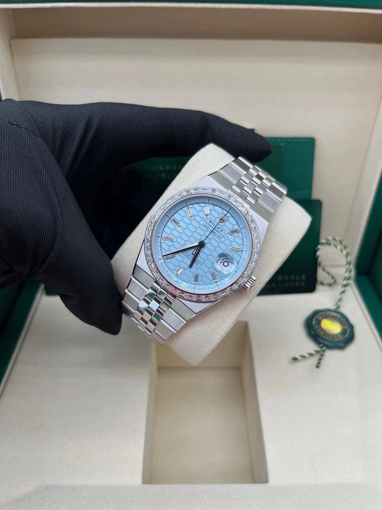 Rolex Land - Dweller 40 Platinum | Blue Dial Baguette Bezel (Ref 127386TBR) - WatchesOff5thWristwatch