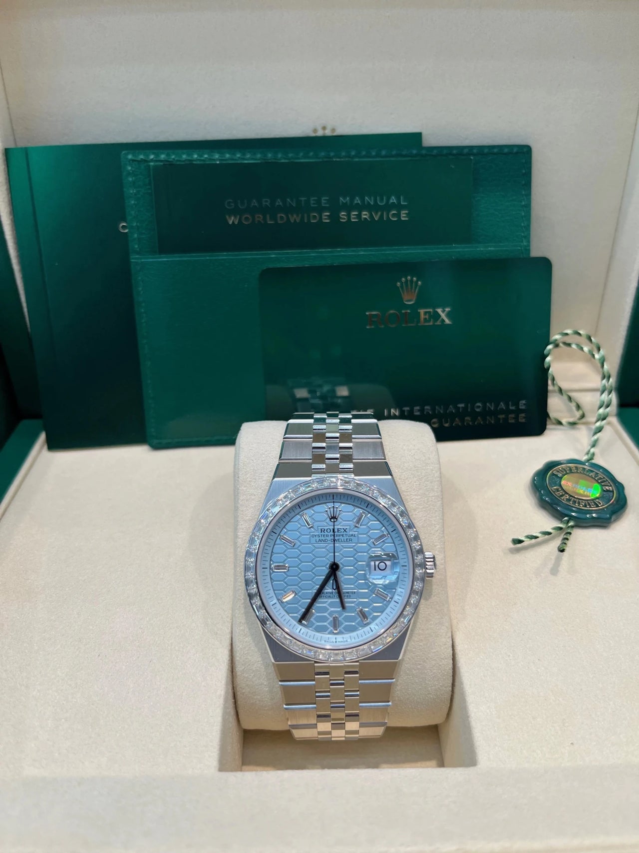 Rolex Land - Dweller 40 Platinum | Blue Dial Baguette Bezel (Ref 127386TBR) - WatchesOff5thWristwatch
