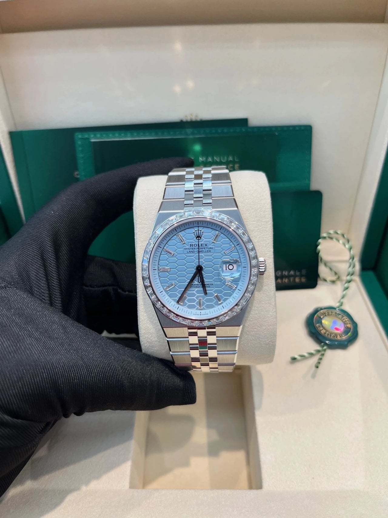 Rolex Land - Dweller 40 Platinum | Blue Dial Baguette Bezel (Ref 127386TBR) - WatchesOff5thWristwatch