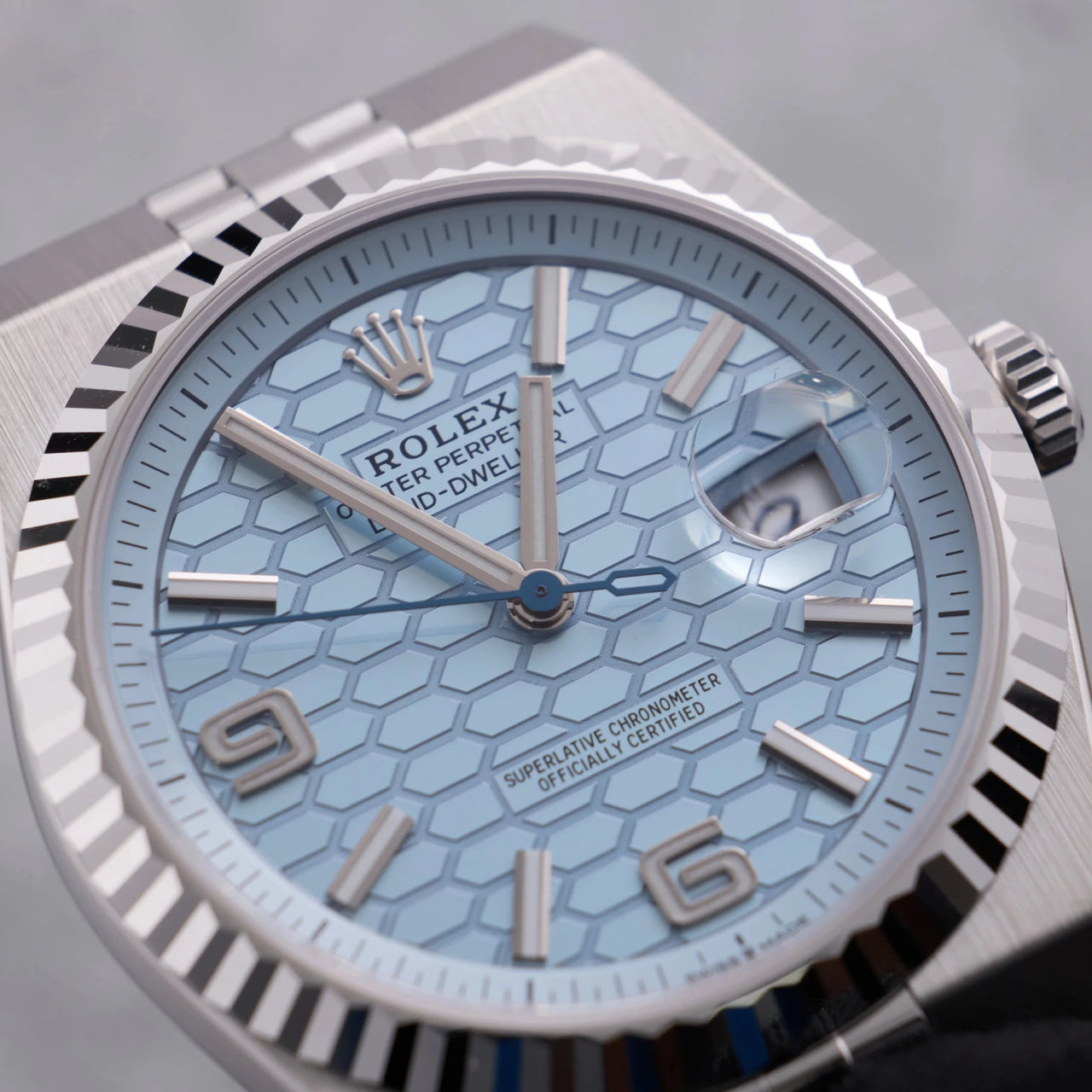 Rolex Land-Dweller 40mm Platinum Ice Blue Honeycomb Dial Fluted Bezel Flat Jubilee Bracelet (Ref 127336) - WatchesOff5thWristwatch