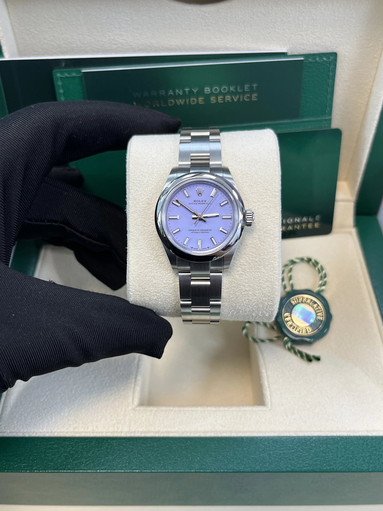 Rolex Oyster Perpetual - rolex-oyster-perpetual-31-277200-lavender-in-hand-left.webp