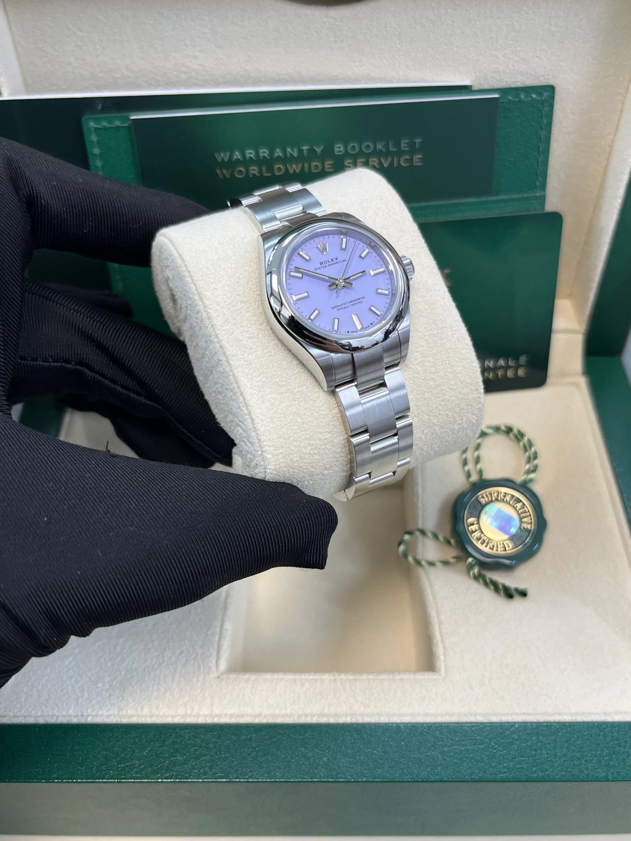 Rolex Oyster Perpetual - rolex-oyster-perpetual-31-277200-lavender-in-hand-right.webp