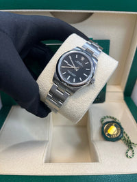 Thumbnail for Rolex Oyster Perpetual 31mm Bright Black Dial Steel Reference 277200 - WatchesOff5thWatch