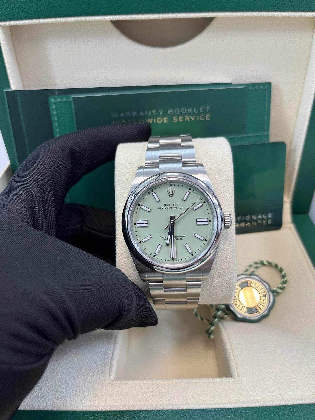 Rolex Oyster Perpetual - rolex-oyster-perpetual-34-134300-pistachio-in-hand-angle.webp
