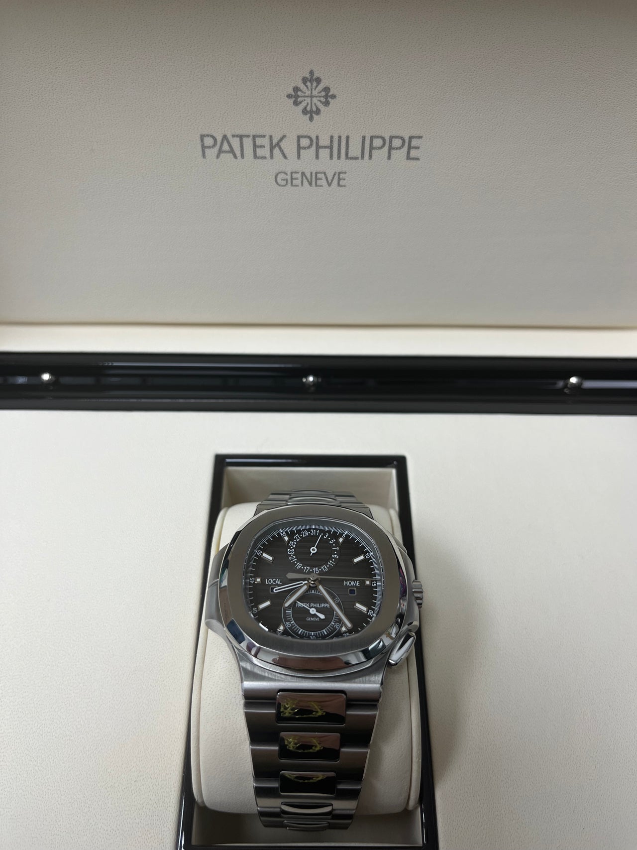 Patek Philippe Nautilus Travel Time Chronograph/ Stainless Steel/ Black Graduated Dial (Ref# 5990/1A-001)