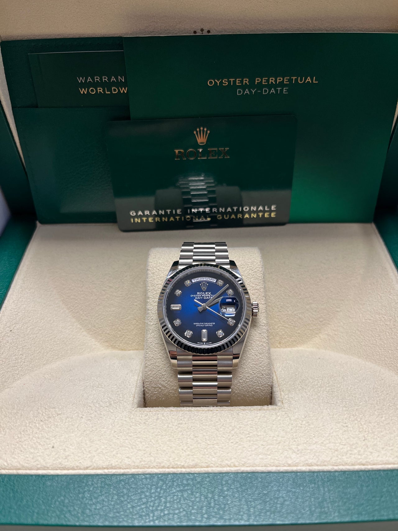 Rolex White Gold Day-Date 36 Watch - Fluted Bezel - Blue Ombre´ Diamond Dial - President Bracelet (Ref # 128239)