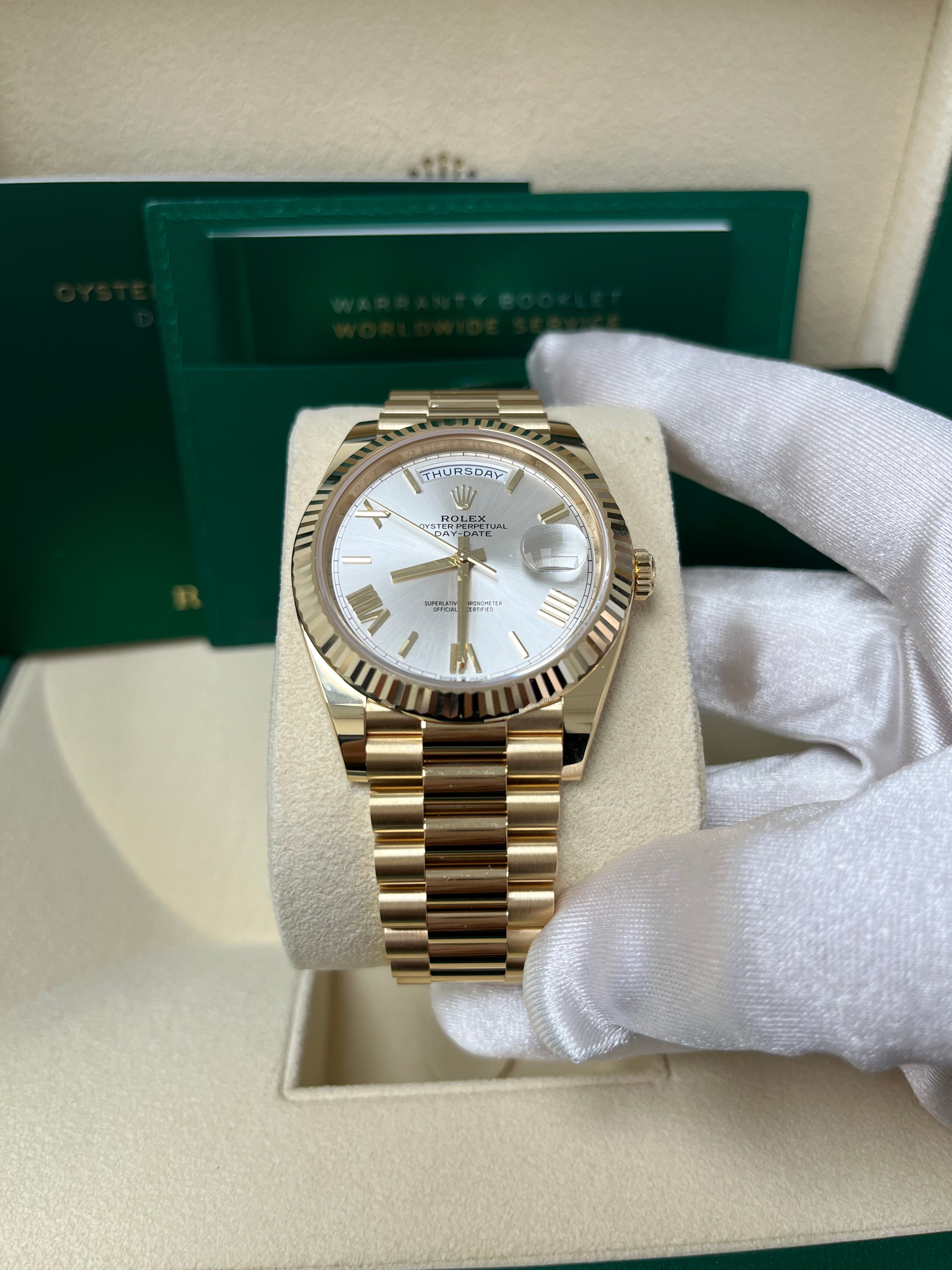 Rolex Day-Date 40 Yellow Gold Silver Roman Dial Fluted Bezel (Ref # 228238)