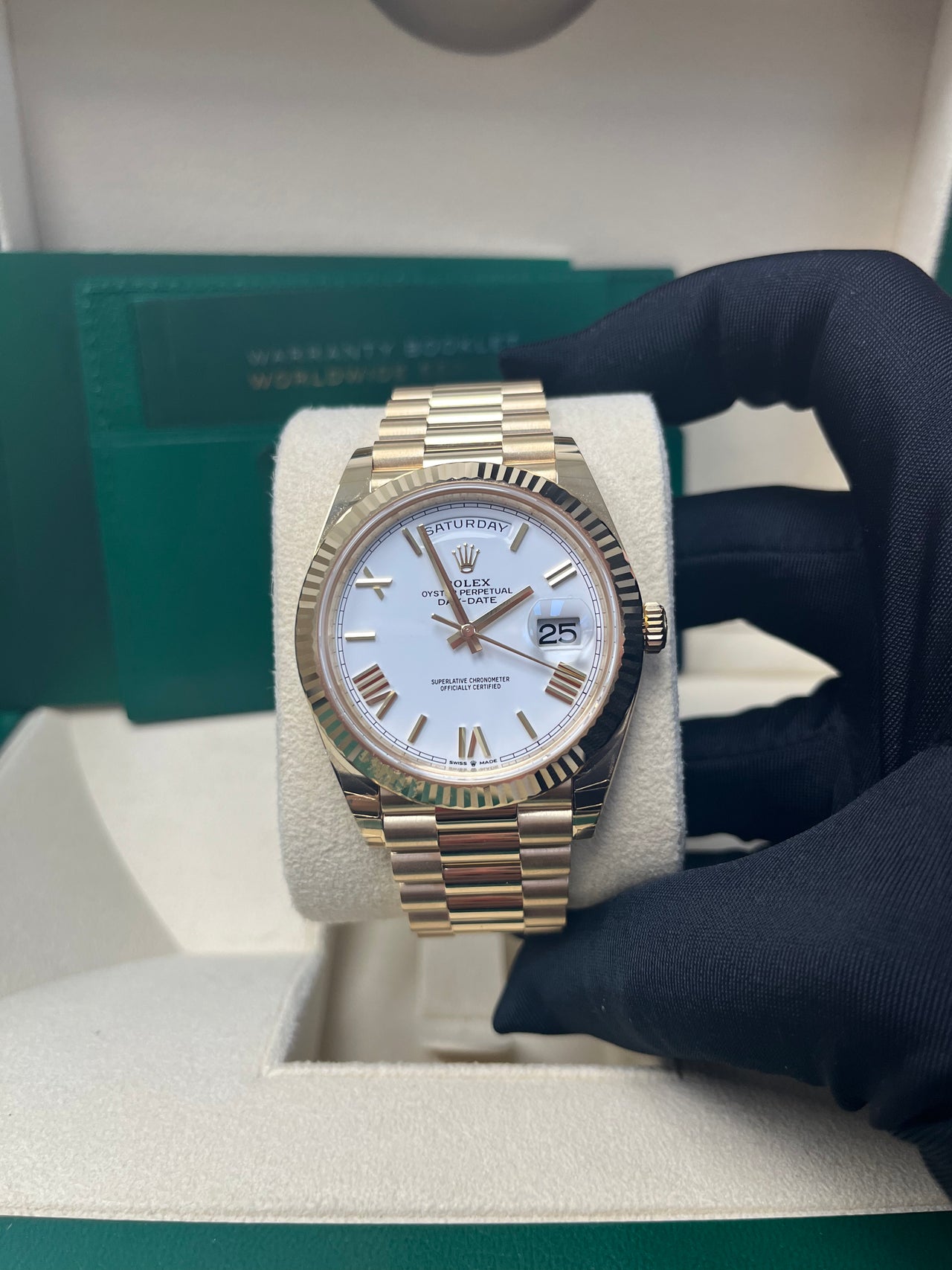 Rolex Day-Date 40 Yellow Gold White Roman Dial Fluted Bezel (Ref# 228238)