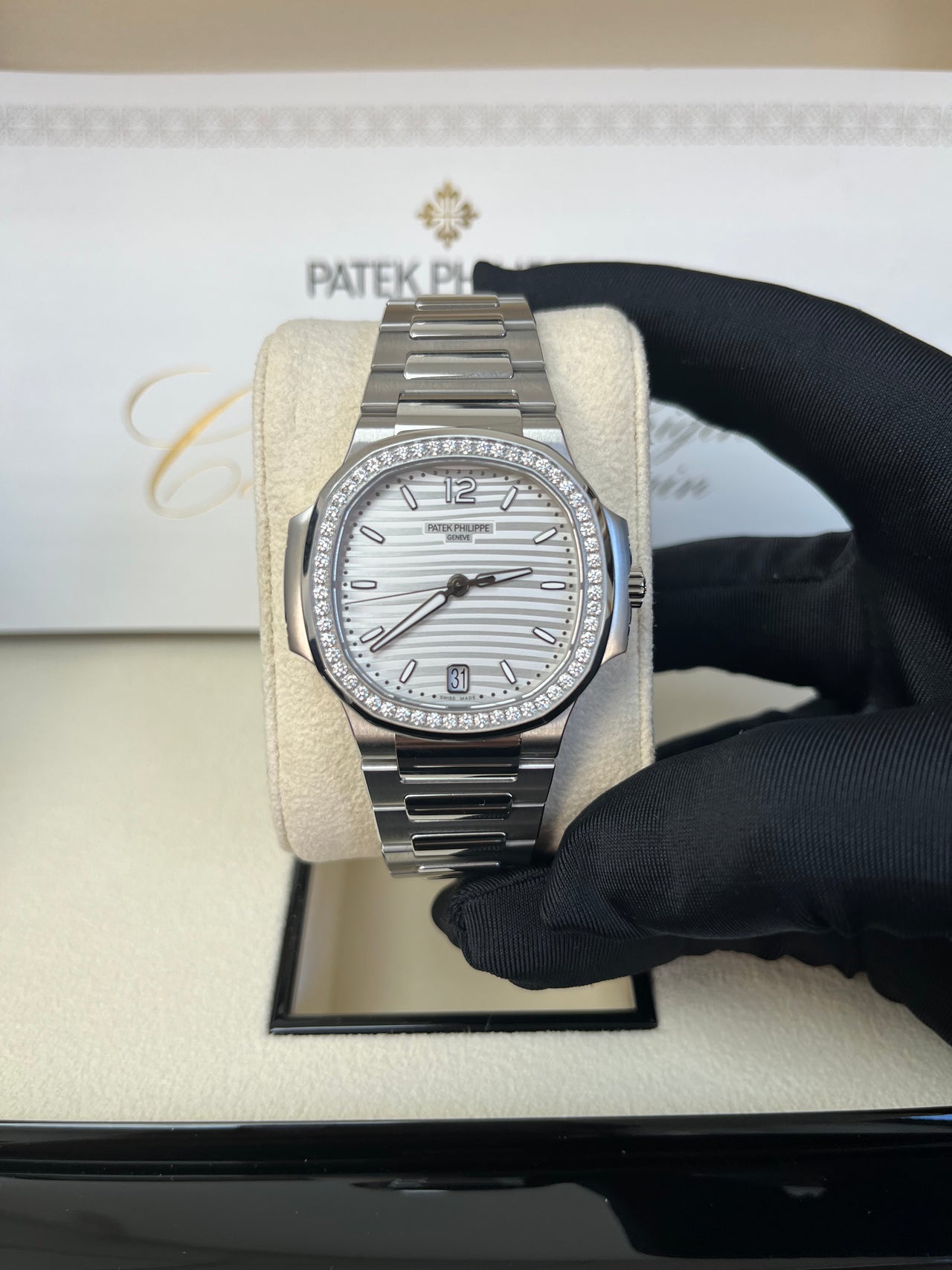 Patek Philippe Nautilus Diamond Bezel Silver Index Dial Reference #7118/1200A-010