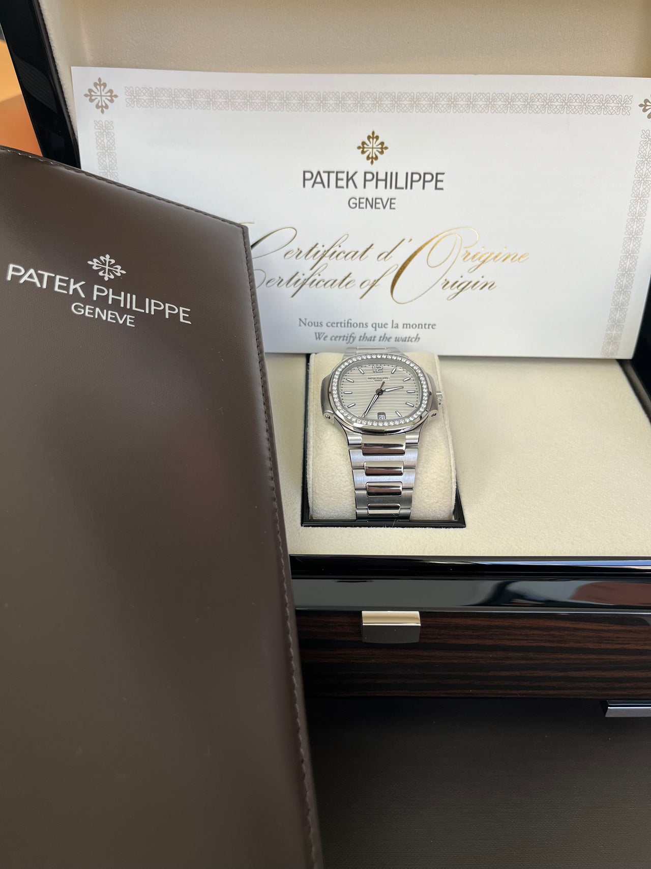 Patek Philippe Nautilus Diamond Bezel Silver Index Dial Reference #7118/1200A-010