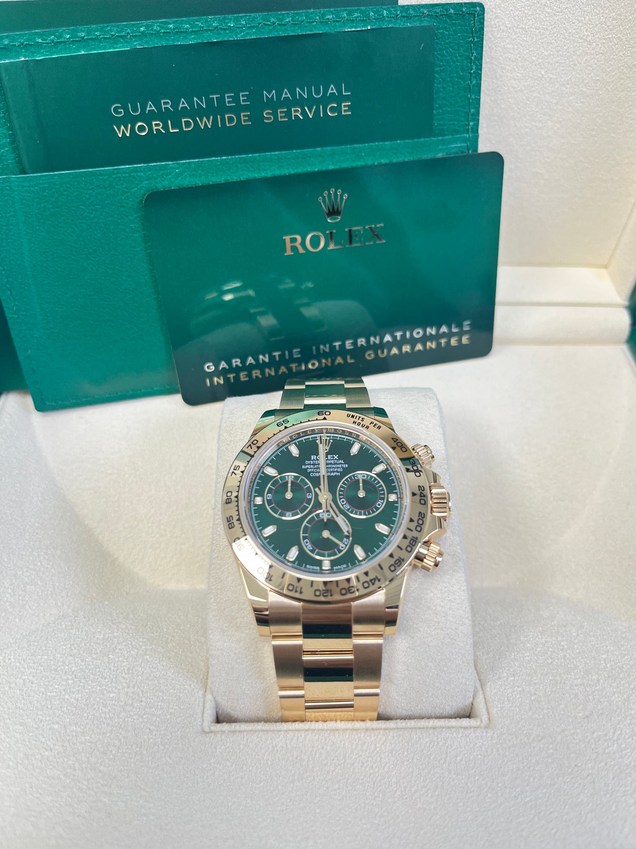 Gold rolex daytona green dial best sale