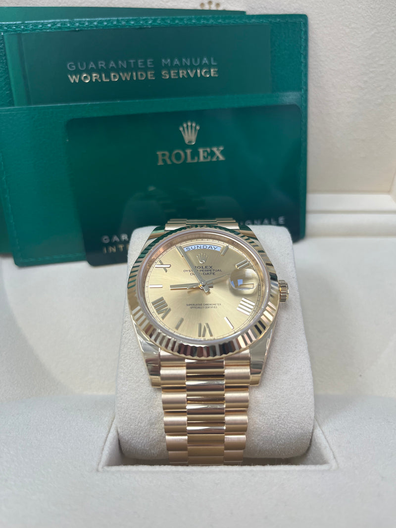 Rolex day date 40 sales yellow gold champagne dial