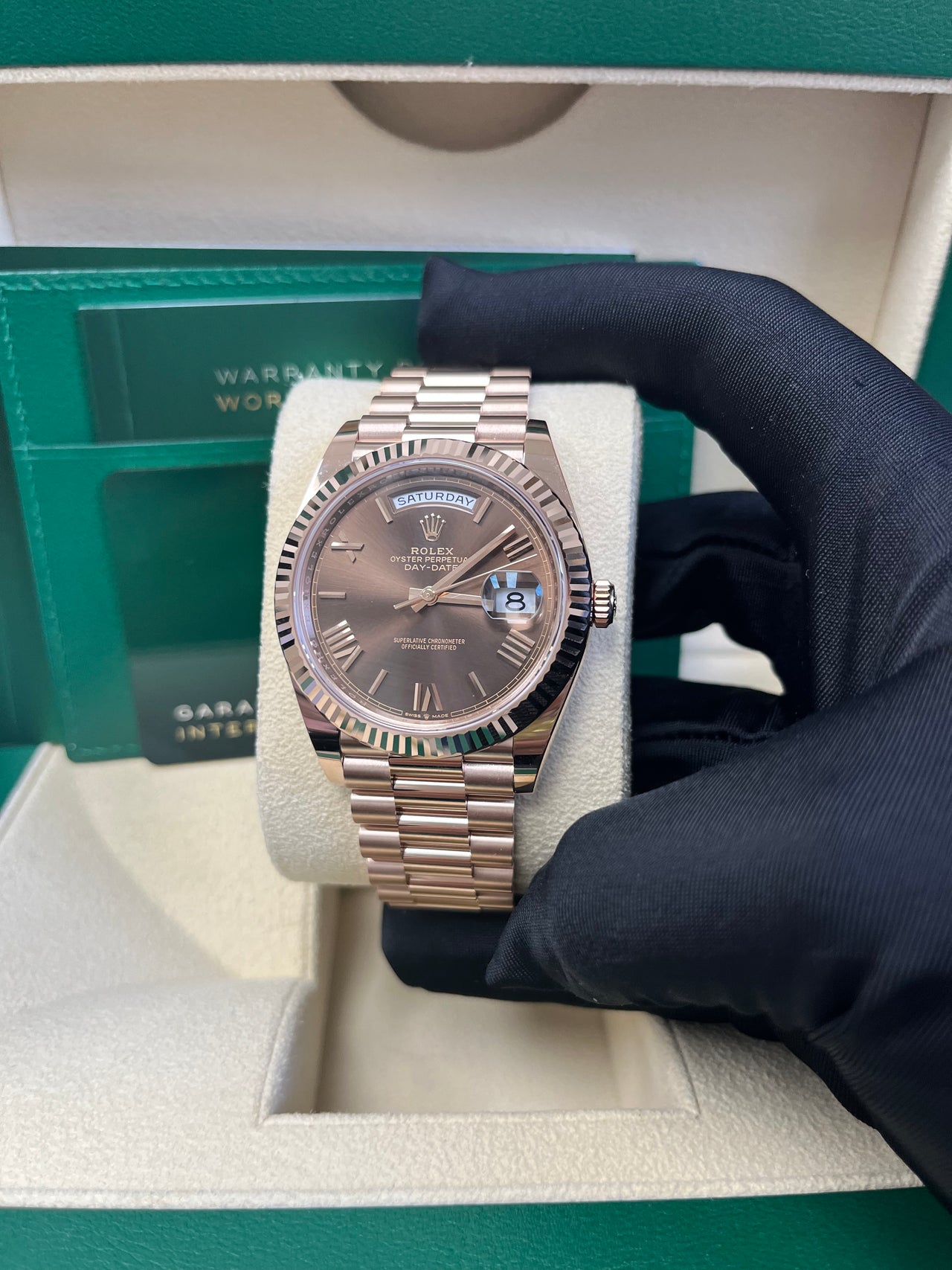 Rolex Day-Date 40 Rose Gold w/ Chocolate Roman Dial & Fluted Bezel (Ref# 228235)